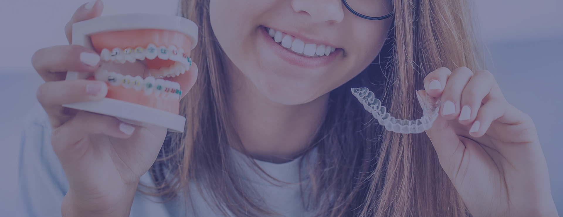 Girl with braces and Invisalign figuring out orthodontic FAQs